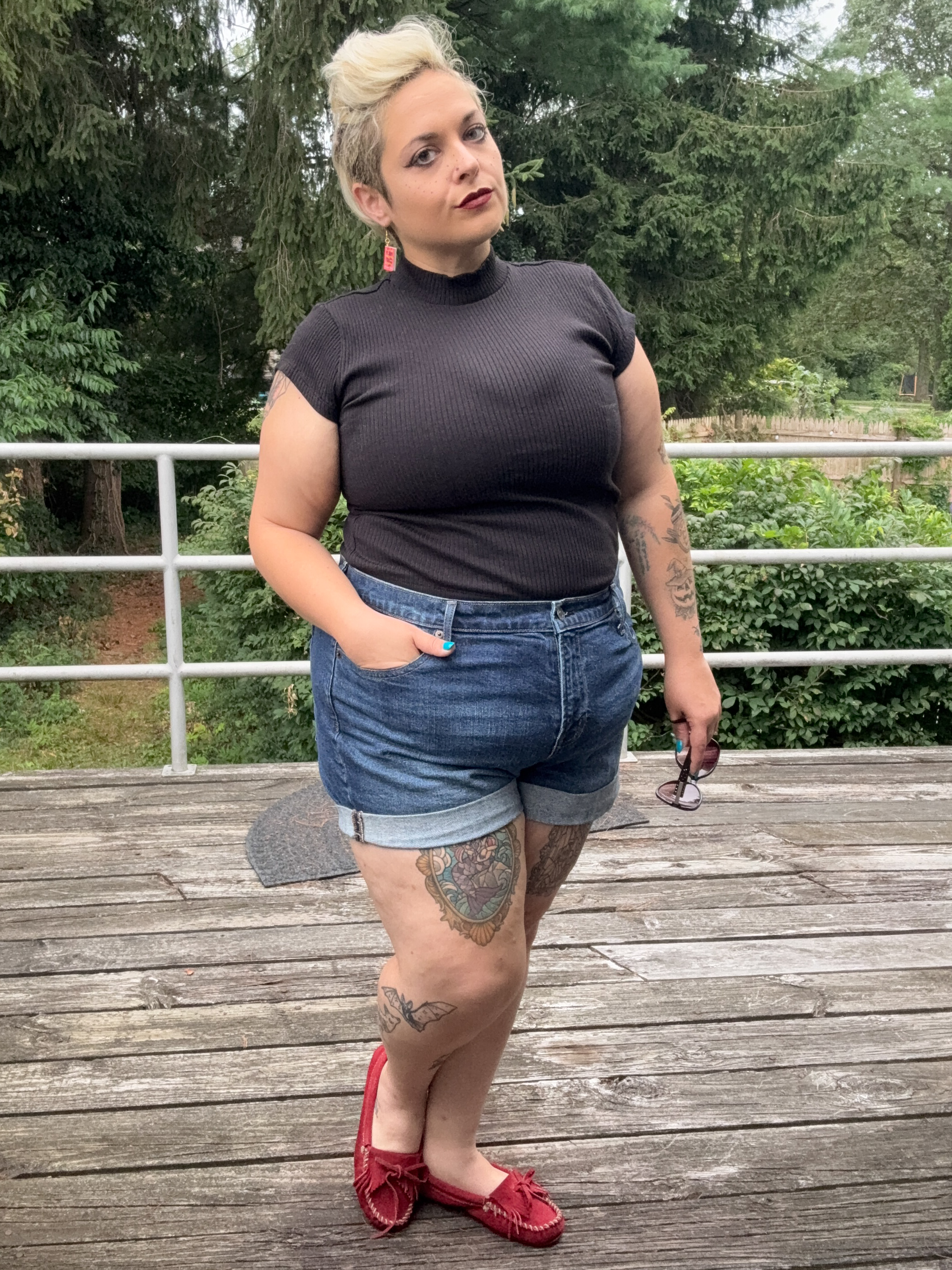 Megz showing off a summer outfit in 2025